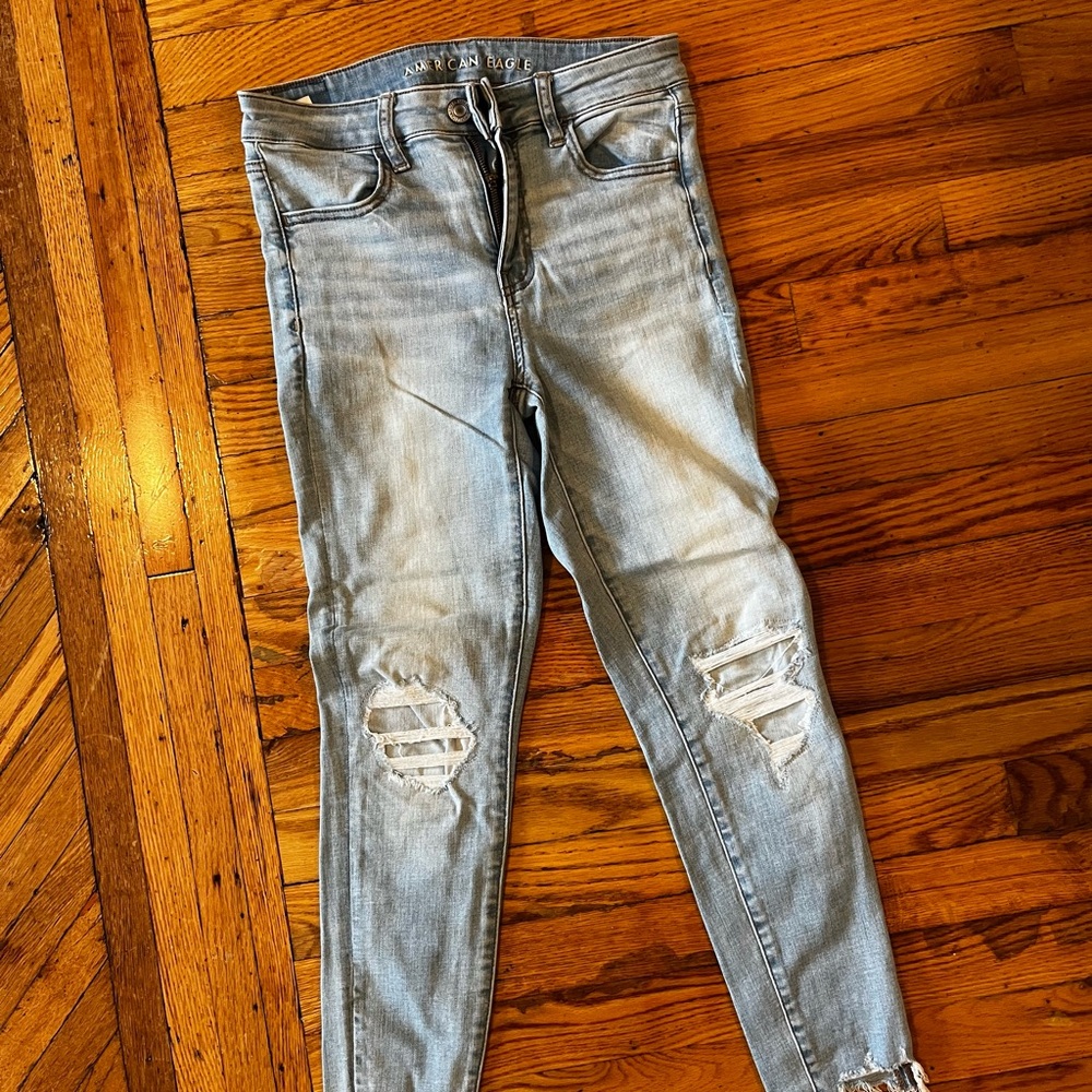 American Eagle Outfitters Light Wash Ripped Super Stretch Skinny Short Jeans